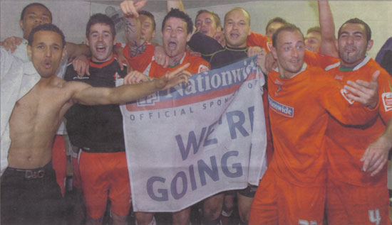 Celebrations after the Town clinch promotion against Walsall on the last match of the season